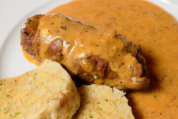Beef Roulade or Rindsroulade with Semmelknodel Dumpling, Sour Cream Gravy Close Up