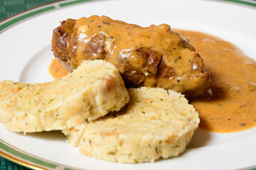 Beef Roulade or Rindsroulade with Semmelknodel Dumpling, Sour Cream Gravy Close Up