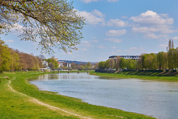 embankment of the river uzh. wonderful urban scenery in summer. view from beneath the shadow of a...
