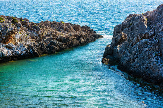 View of the iconic secluded beach of Glossa near the famous Voidokilia beach