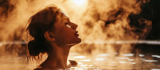 Poster Woman unwinding in a steam room © AkuAku