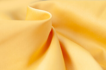 Abstract fabric texture in natural light color as a conceptual background. Texture of fabric made...