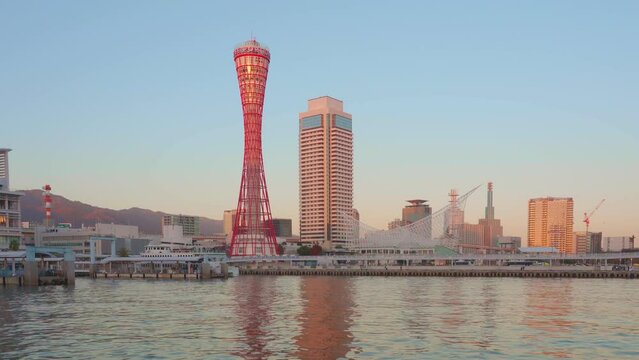 Kobe is a city on Osaka Bay in central Japan,  View of Kobe Port at Sunset