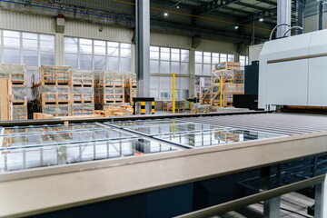 Conveyor production of large sheets of cut glass. Cutting, washing, framing, tempering of glass by...