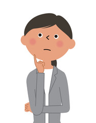 考えるスーツの女性