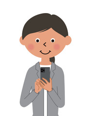 スマホを操作するスーツの女性