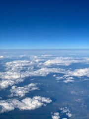 view from plane over europe blue sky