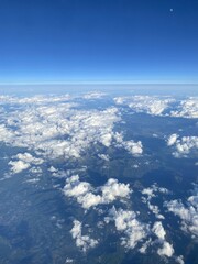 Fototapeta na wymiar view from plane over europe blue sky