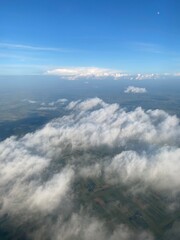 view from plane over europe blue sky