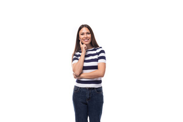 charming slim young brunette woman in a black and white striped t-shirt on a white background with copy space