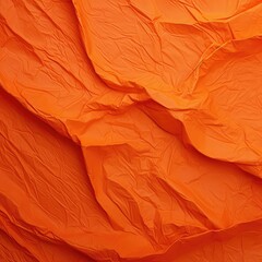"Warm Embrace: Close-Up View of Orange Wrinkled Paper"