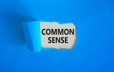 Common sense symbol. Concept words Common sense on beautiful white paper. Beautiful blue table blue...