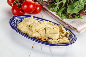 Creamy hummus in the bowl