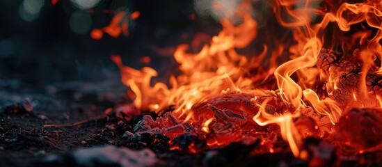Various red flames danced naturally in the dark at night.