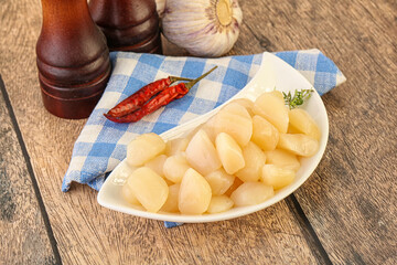 Raw scallop seafood in the bowl