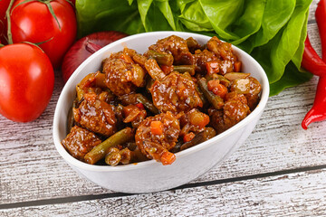 Meatball with vegetables and spices