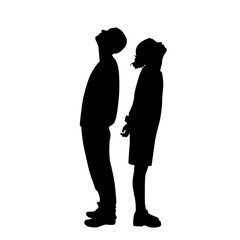 Vector silhouettes of a man and a woman, a couple of business people standing in profile, looking up, black color on a white background