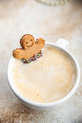 gingerbread and a cup of hot coffee christmas cookie taste christmas sweet dessert holiday baking treat new year and christmas celebration meal food snack on the table