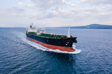 Cargo bulk vessel or ship is going at sea in Dardanelles maritime waterway, Aerial view
