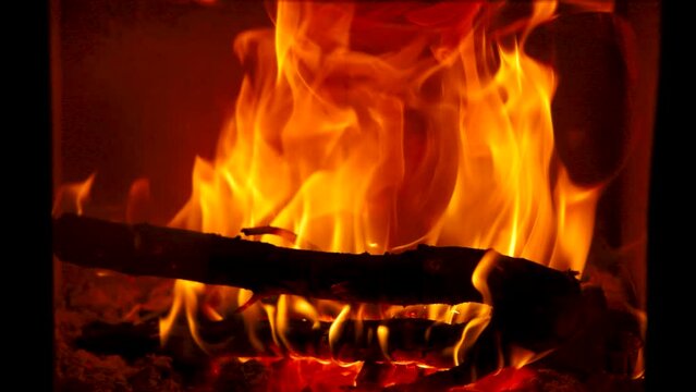Slow motion fire in fireplace