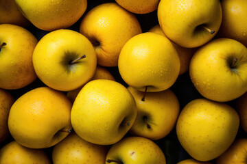 Fresh yellow apples background, texture