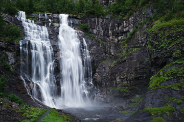 Fototapeta na wymiar waterfall in the mountains in norway