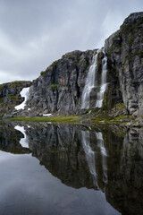 Fototapeta na wymiar waterfall in the mountains in norway