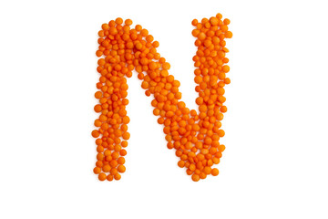 The capital letter 'N' formed from red lentil grains against a clean white backdrop. Perfect for a food blog and menu