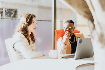 Businesspeople collaborating and discussing project details in a creative meeting to find opportunities for business expansion and profitability.