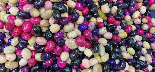 Olives in a mass of different colors