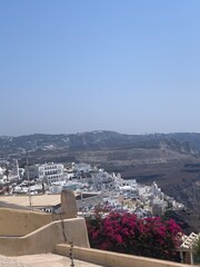 Beautiful Oia town on Santorini island, Greece. Traditional white architecture and greek orthodox...