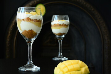 Mango dessert with cookies and yogurt