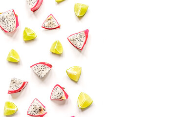 pattern with sliced kiwi and pitaya on white background top view mockup