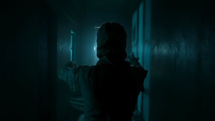 Portrait of ghost person in the house. Mummy covered in white cloth ribbons walking in the corridor with blue flashing lightning.