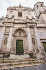 Obraz premium Main facade of Valladolid Cathedral with a huge wooden door, Castilla LEon.