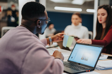 Colleagues collaborating in a corporate office, discussing statistics and planning projects for business expansion and financial growth.