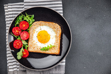 fried egg bread toast scrambled yolk protein delicious breakfast hearty food fresh delicious healthy eating cooking appetizer meal food snack on the table