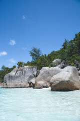 Anze Lazio, Praslin Island, Seychelles, and the typical granite stones. Tropical paradise, crystal clear tranquil waters, white sand, paradise on earth. Vacation mood, relaxation, serendipity.