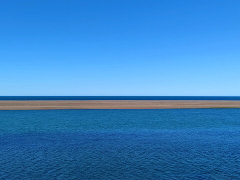 Blue Coastline and Sandbank in Patagonia, Tierra del Fuego, Argentina.