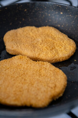 schnitzel in black pan