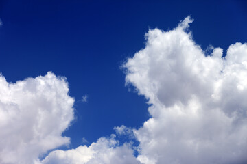 Naklejka na ściany i meble Blue sky with clouds at nice day