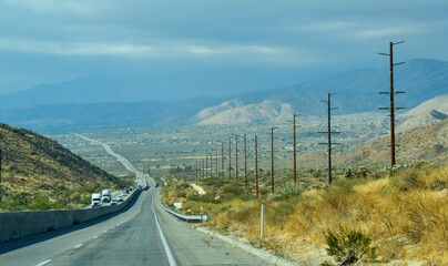 Asphalt Road in a Valley in the Foothills of the California Desert.