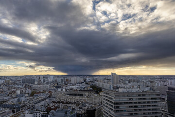 A dramatic photo of an approaching storm in Paris from a high vantage point