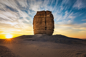 Judah thumb or devil thumb is a rock formation in the desert near Riyadh, Saudi Arabia sunrise...