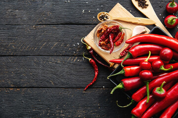 Red hot chili pepper composition, spicy organic paprika background