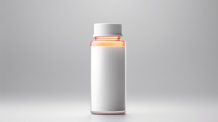  an orange and white pill bottle sitting on a white surface with a white cap on the top of the bottle.