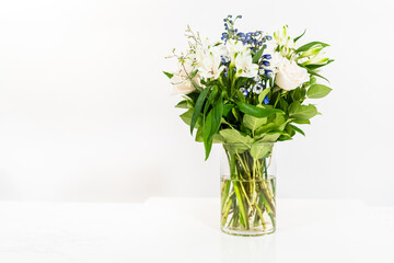 Elegant White Rose Bouquet Adorns a Beautiful Vase