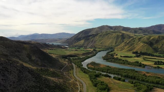 Waitaki river and lake in Kurow town mountains of New zealand &ndash; aerial landscape 4k.
