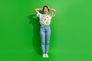 Full body length photo of staring funny young girl hands head unbelievable reaction looking...