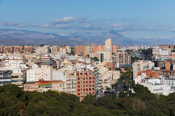 Fototapeta na wymiar View of Alicante, mountains, and city houses.